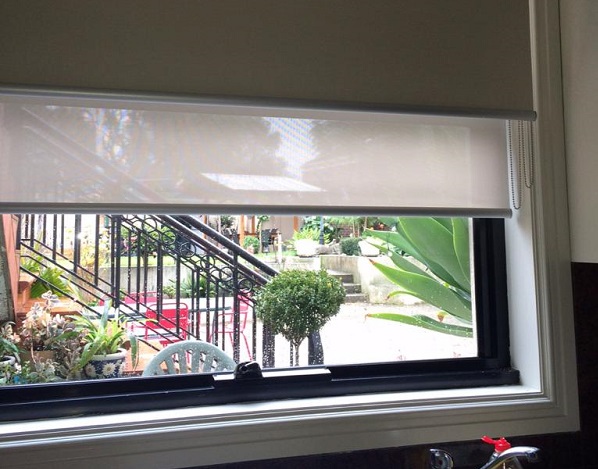 Double Roller Blinds consisting of a Block out Night Roller Blind and a See through Day Blind, these are installed in a kitchen setting in Tarrawarra VIC 3775