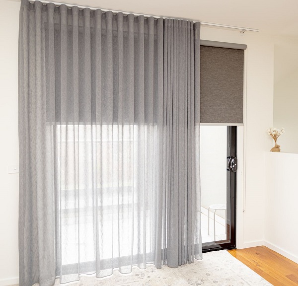 Sheer Curtain over block out roller blind mounted on sliding door