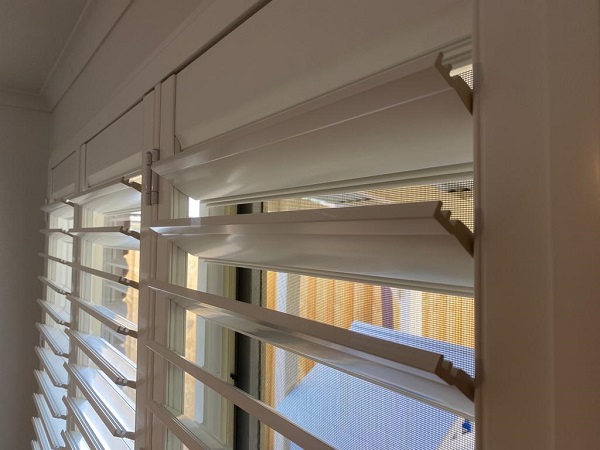 Night time Plantation Shutters with louvers opened to view the light control slats The Patch (postcode} VIC